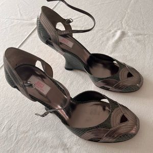 Silver metallic and grey snakeskin embossed leather heels. Never worn. Size 8.